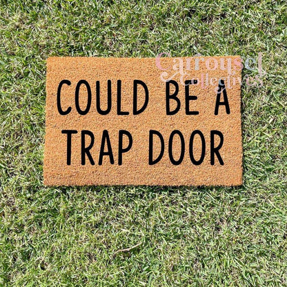 Could be a trapdoor doormat, custom doormat, personalised doormat, door mat