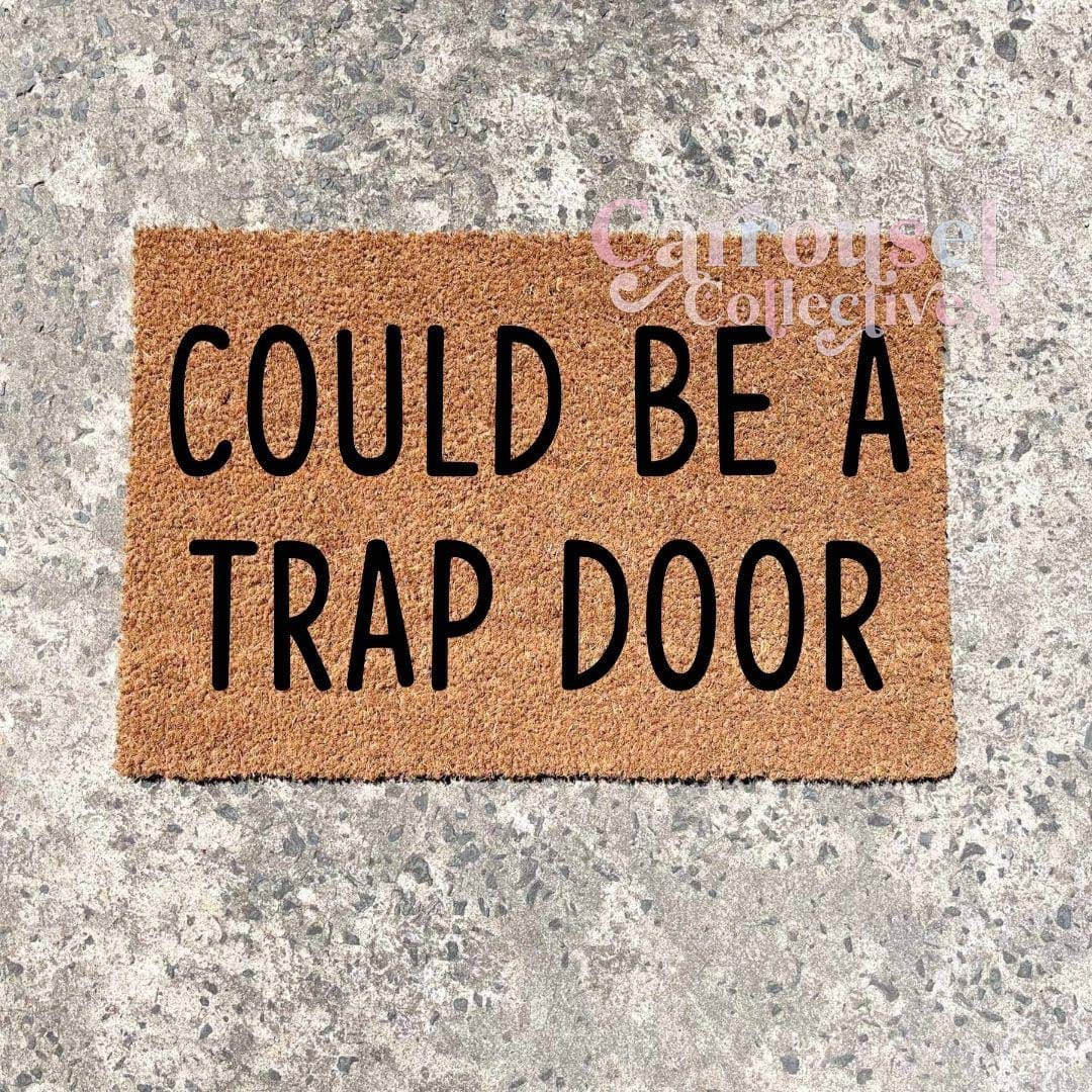 Could be a trapdoor doormat, custom doormat, personalised doormat, door mat