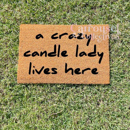 A crazy candle lady lives here doormat, custom doormat, personalised doormat, door mat