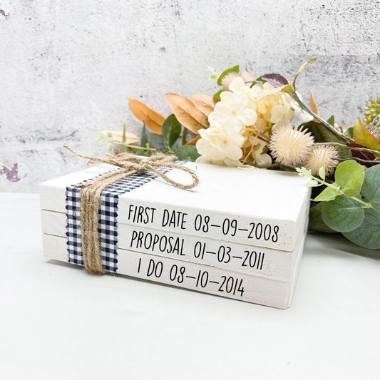 First date, Proposal, Wedding faux book stack