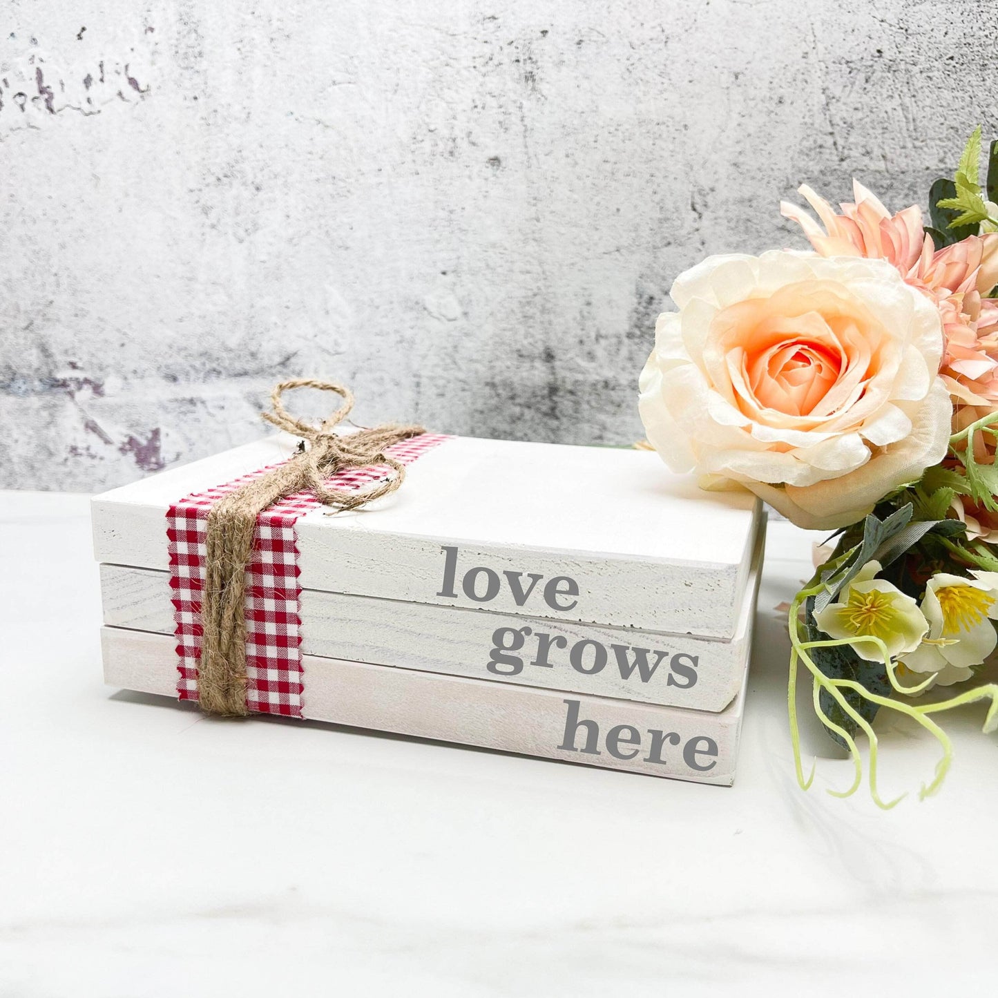 Love grows here faux book stack
